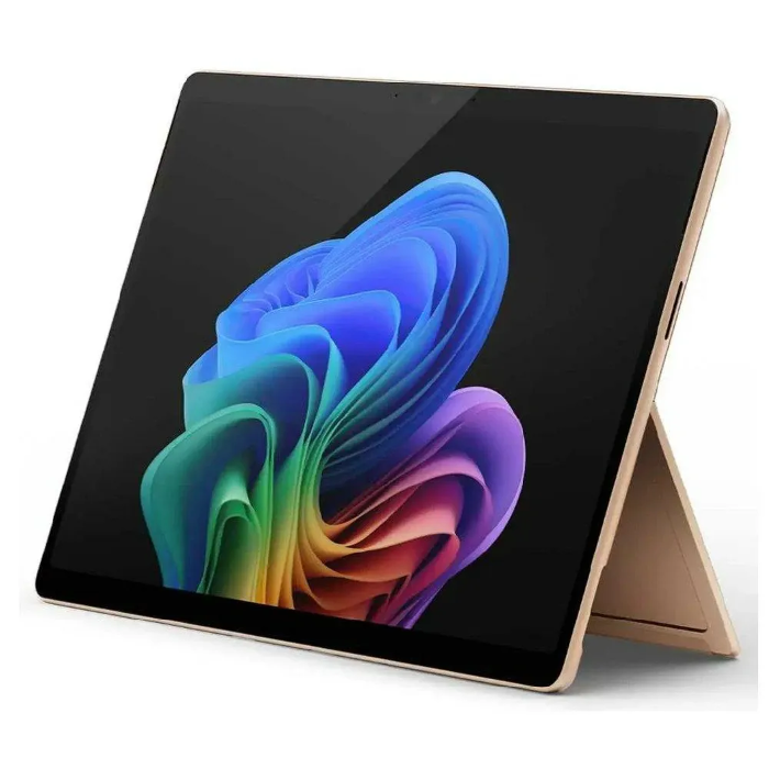 صورة لابتوب Microsoft Surface Pro المحمول، معالج Snapdragon X Elite، ذاكرة وصول عشوائي 16 جيجابايت، قرص صلب SSD بسعة 512 جيجابايت، معالج رسومات Qualcomm Adreno، نظام التشغيل Windows 11 Home، موديل ZIA-00052 - الكثبان الرملية